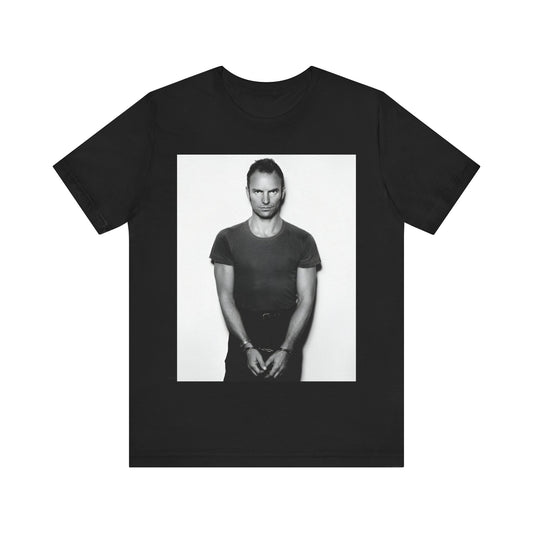 A black graphic t-shirt featuring a black and white portrait photo of Sting.