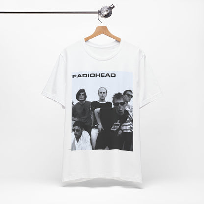 A black graphic t-shirt featuring a vintage 90s graphic related to Radiohead's 'Creep' song or era.