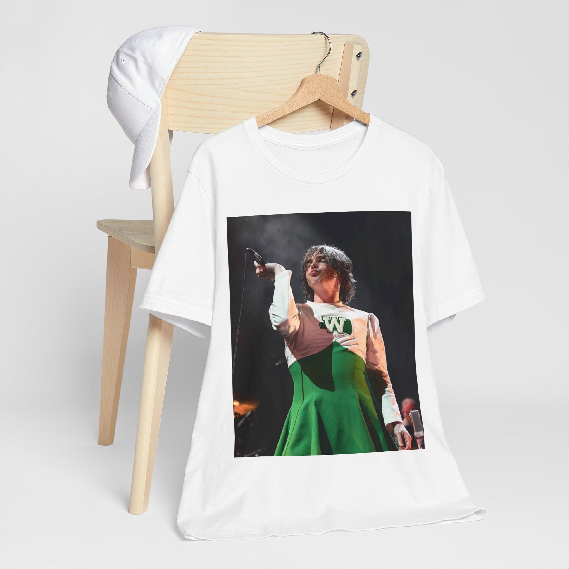 A black graphic t-shirt featuring a photo of My Chemical Romance, possibly with a cheerleader theme.