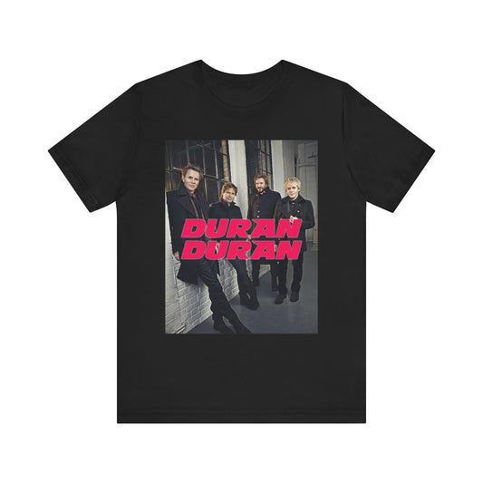 A black graphic t-shirt featuring a modern graphic of Duran Duran, suggesting a pop revival.