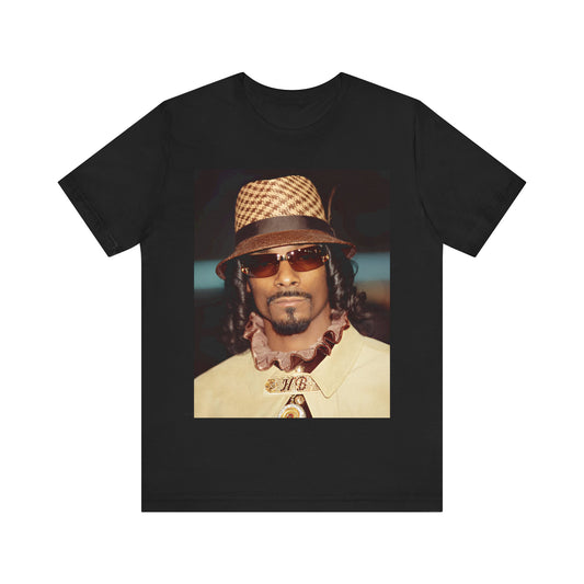 A black graphic t-shirt featuring a glamorous graphic of Snoop Dogg as a Doggfather icon.