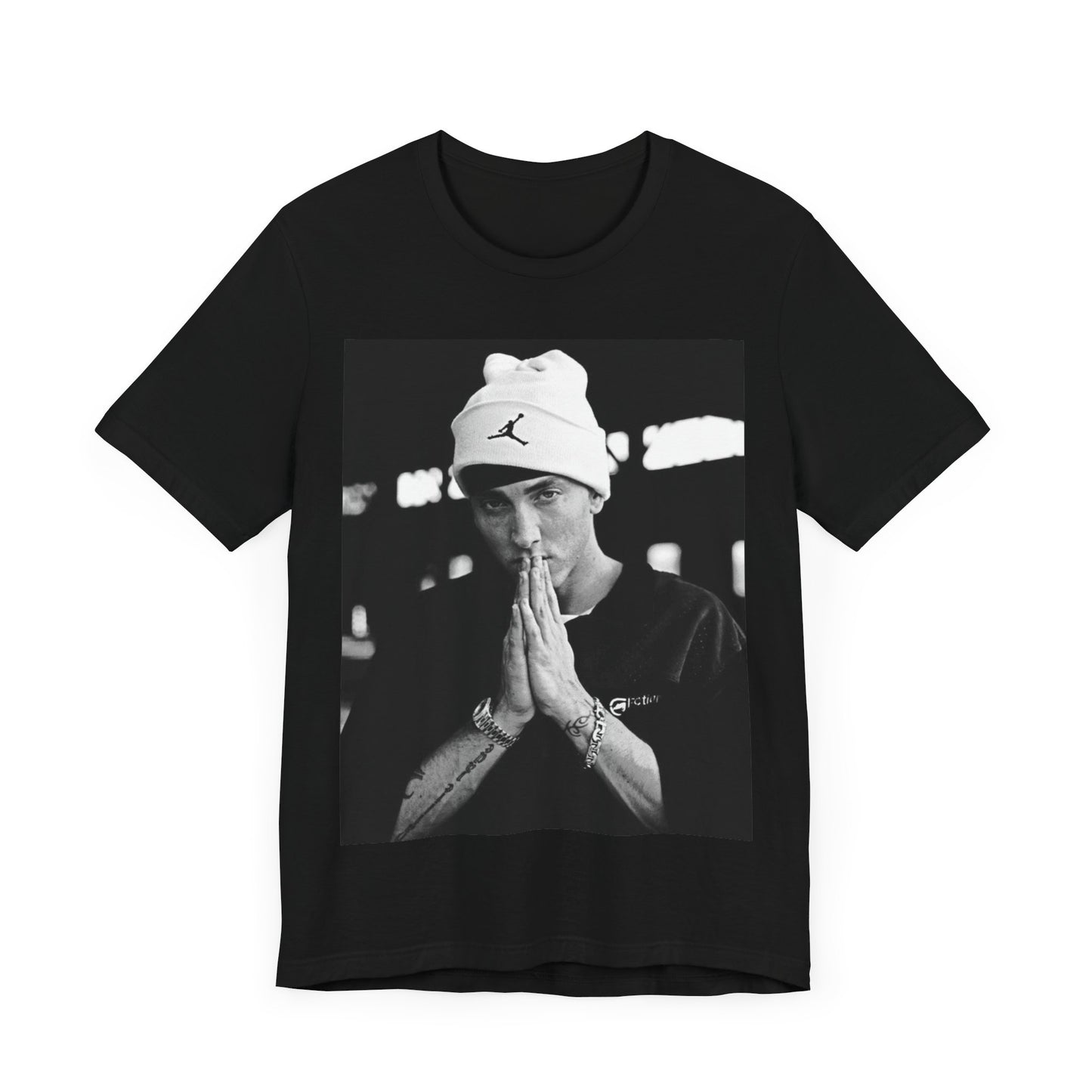 A black graphic t-shirt featuring a black and white portrait photo of Eminem.