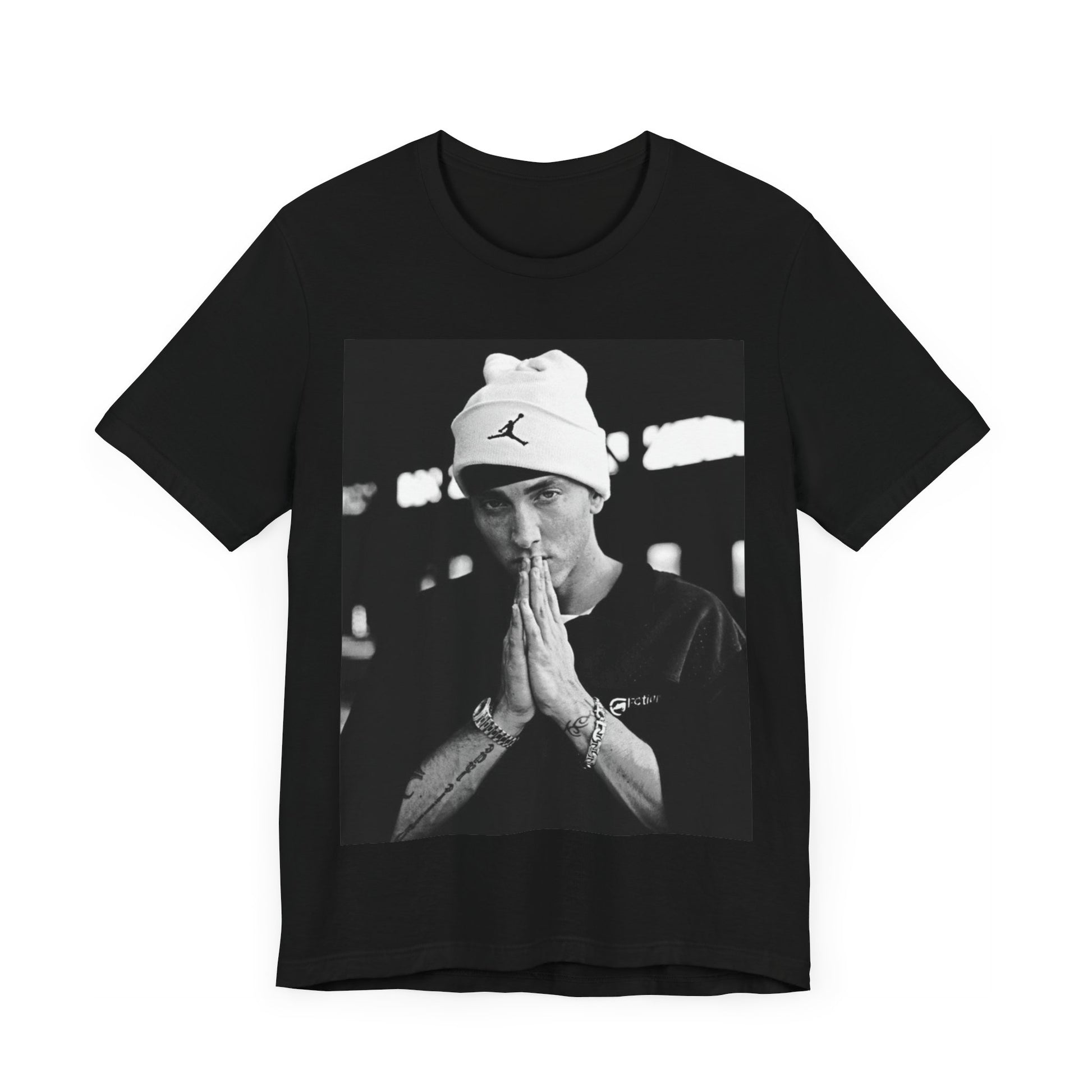 A black graphic t-shirt featuring a black and white portrait photo of Eminem.