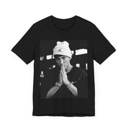 A black graphic t-shirt featuring a black and white portrait photo of Eminem.