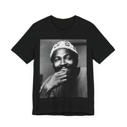 A black graphic t-shirt featuring a 70s retro portrait graphic of Marvin Gaye.