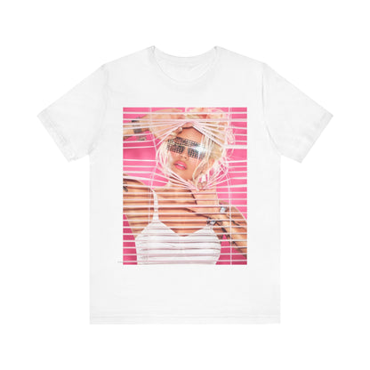 A black graphic t-shirt featuring a graphic of Karol G in a cool Latin trap style.