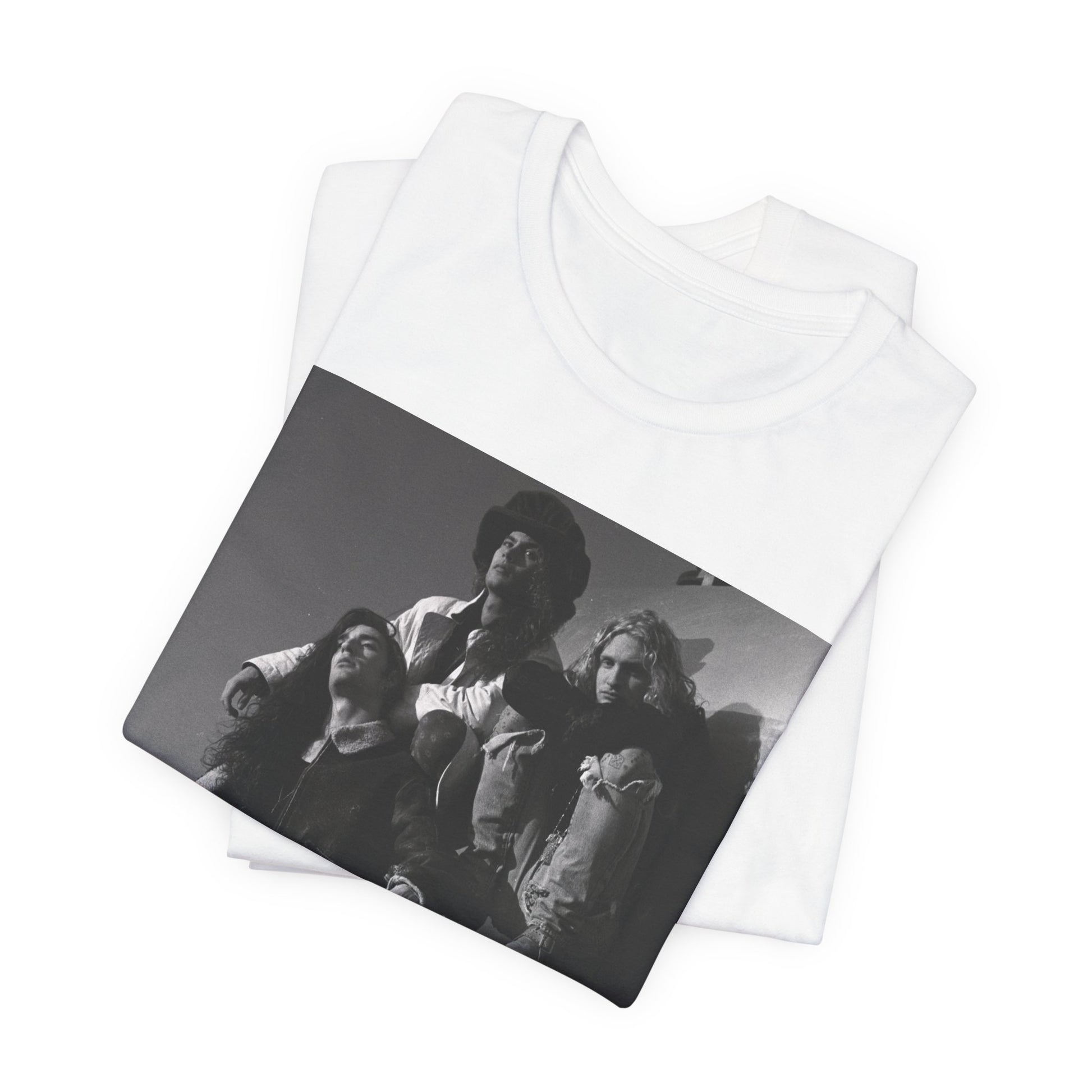 A black graphic t-shirt featuring a 90s black and white photographic portrait of the band Alice In Chains, capturing their iconic grunge look.
