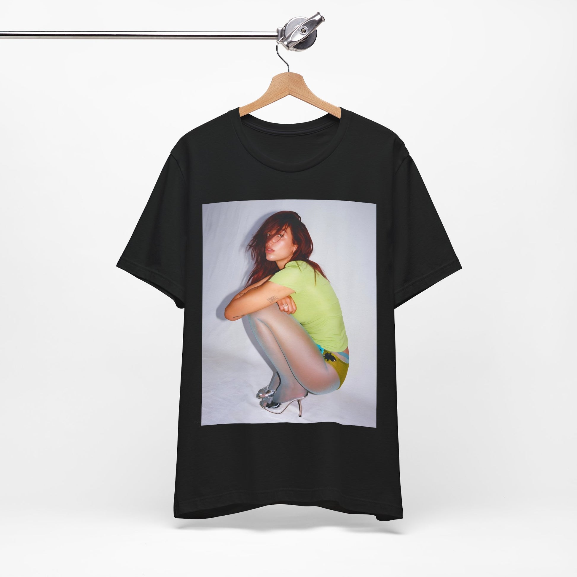 A black graphic t-shirt featuring a graphic inspired by Dua Lipa's 'Houdini' song.