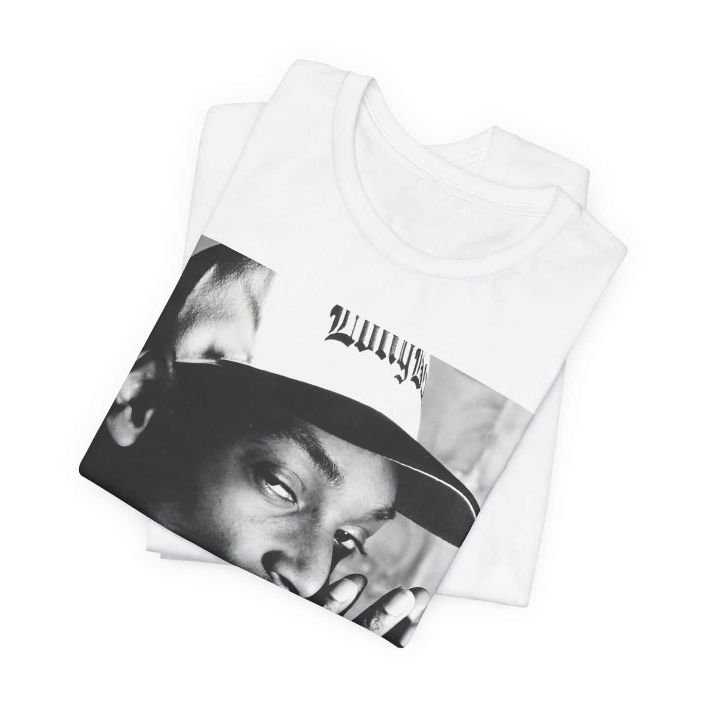 A black graphic t-shirt featuring a cool black and white graphic or photo of Snoop Dogg as a rapper.