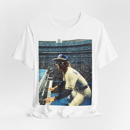 A black graphic t-shirt featuring a photo of Elton John from his 1975 Dodgers Stadium concert.