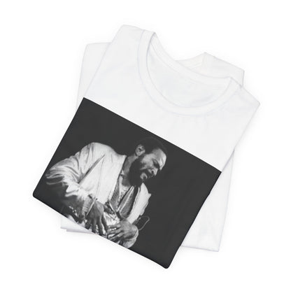 A black graphic t-shirt featuring a 70s Motown concert graphic of Marvin Gaye.