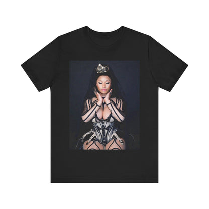 A black graphic t-shirt featuring a vintage graphic of Nicki Minaj as the Queen of Rap.