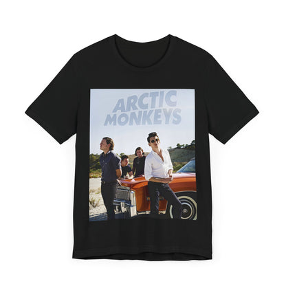 A black graphic t-shirt featuring a design related to Arctic Monkeys' 'AM' album era, possibly with the album art or band imagery.