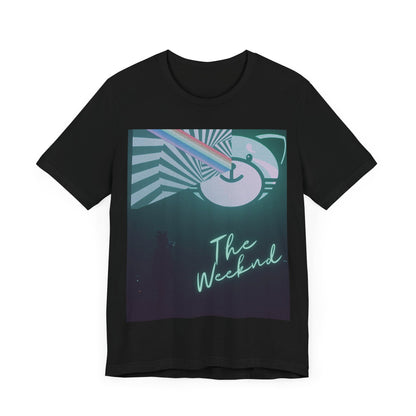 A black graphic t-shirt featuring a vintage concert graphic of The Weeknd from his 'Kiss Land' era.