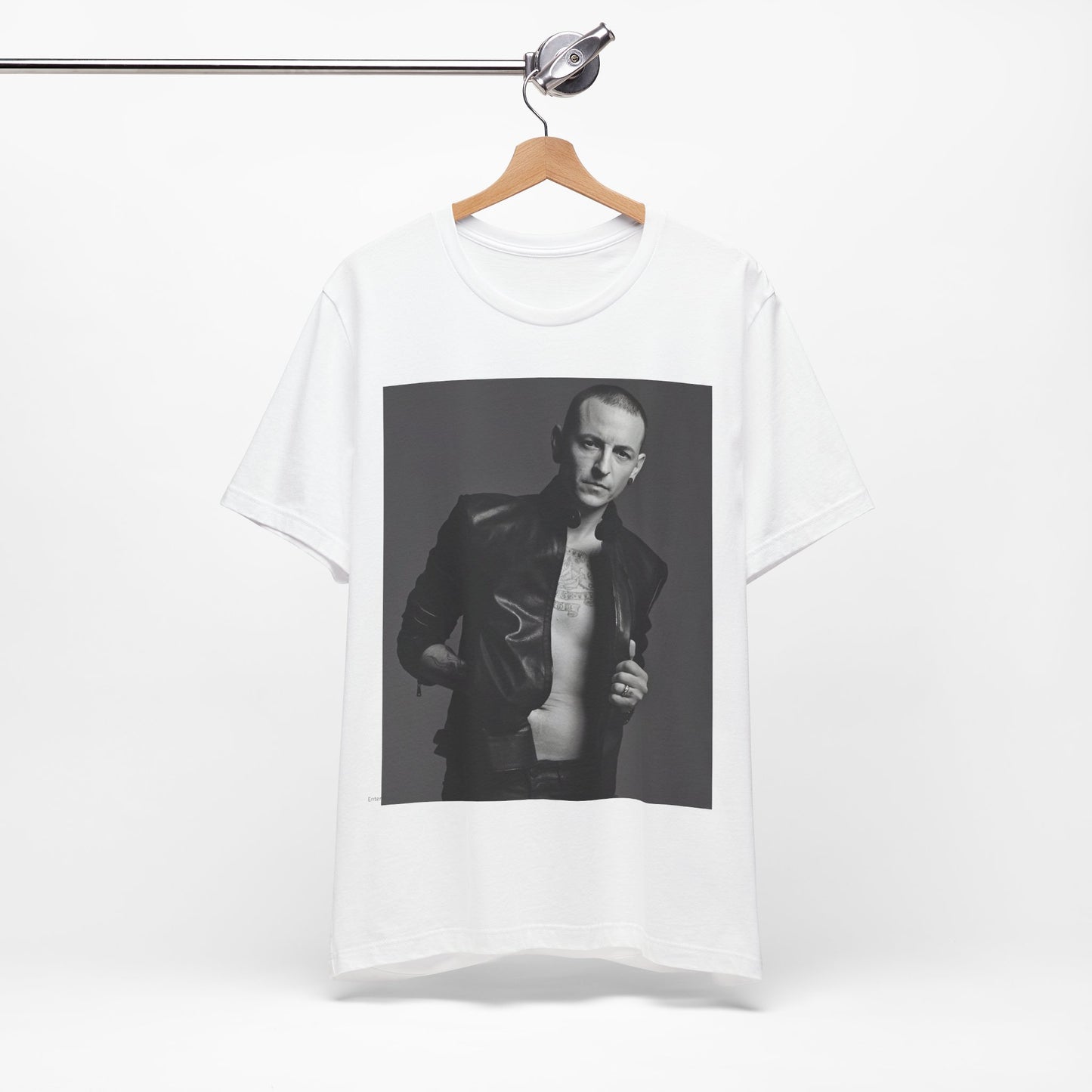 A black graphic t-shirt featuring a graphic of Chester Bennington from Linkin Park as a rock icon.