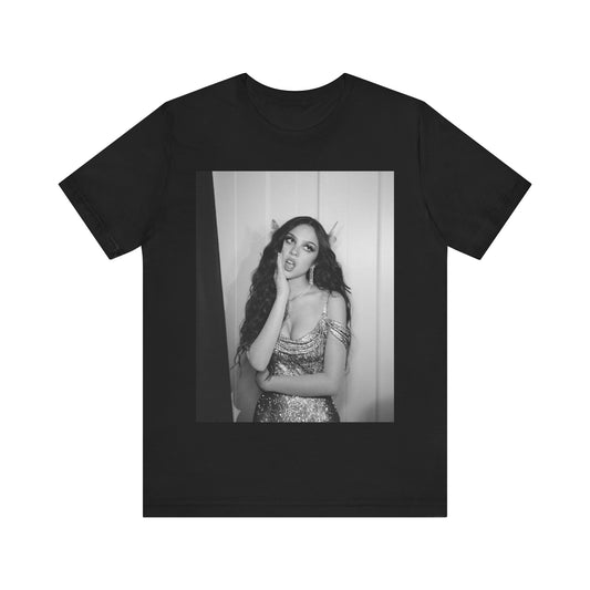 A black graphic t-shirt featuring a black and white, monochrome graphic or photo of Olivia Rodrigo.