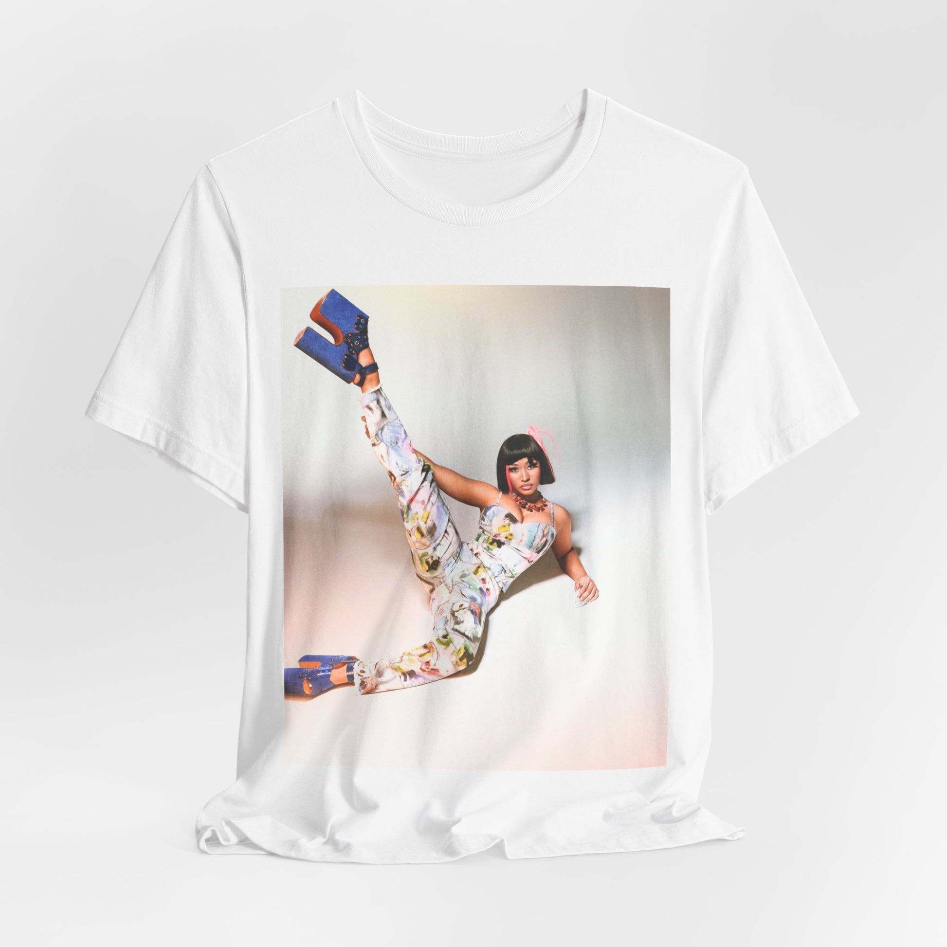 A black graphic t-shirt featuring a graphic of Nicki Minaj as a global fashion rap queen.