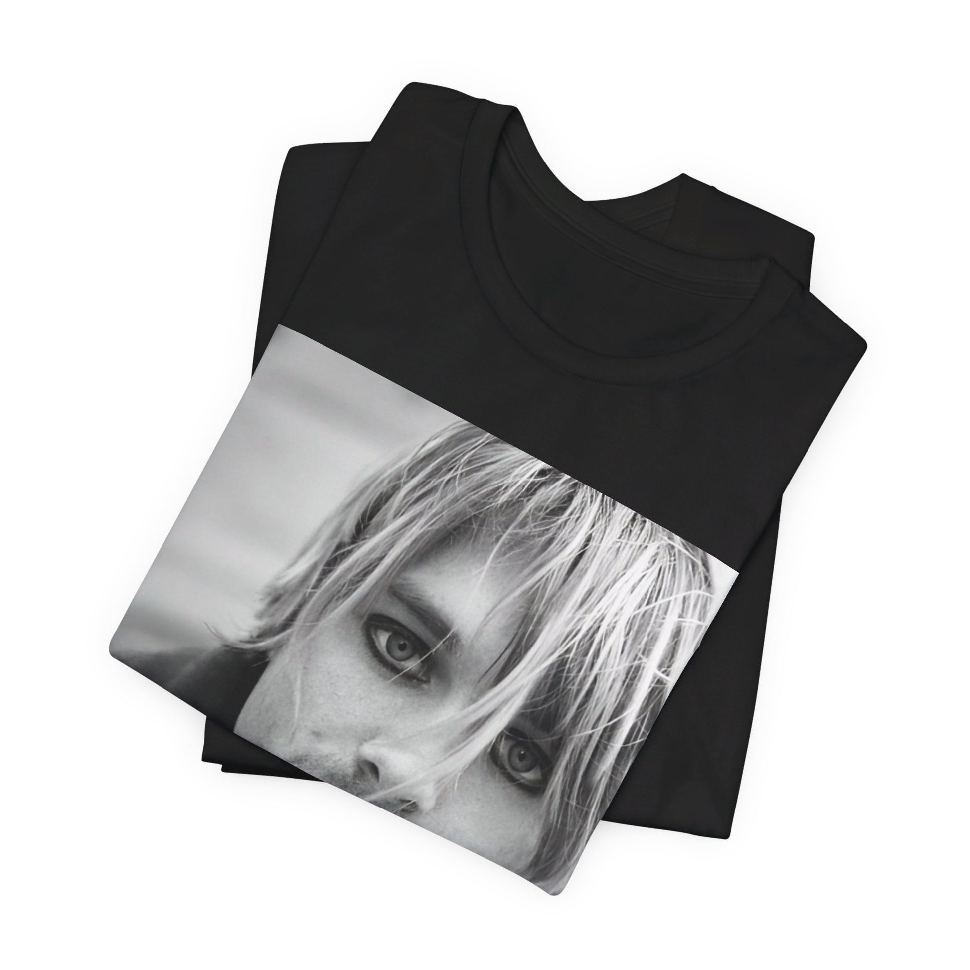 A black graphic t-shirt featuring a classic 90s alt rock graphic of Nirvana.