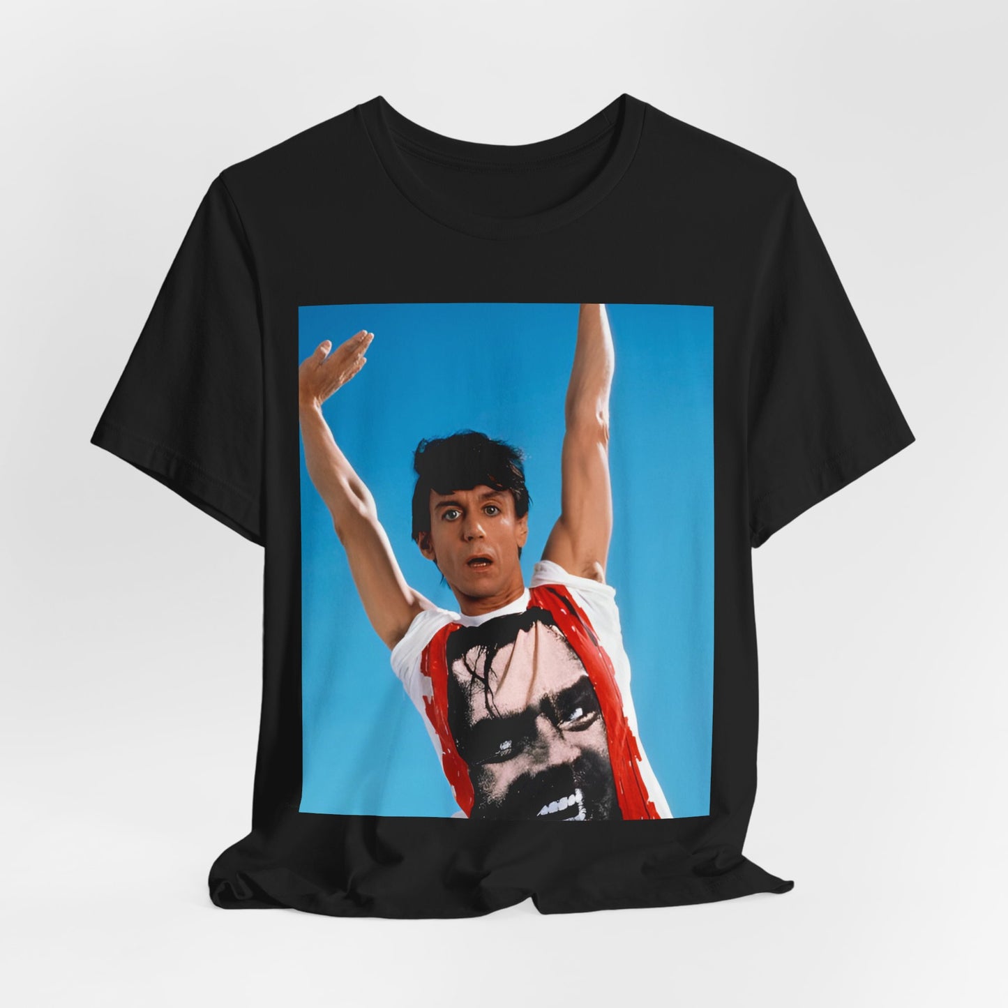 A black graphic t-shirt featuring a 70s graphic of Iggy Pop with a 'Raw Power' aesthetic.