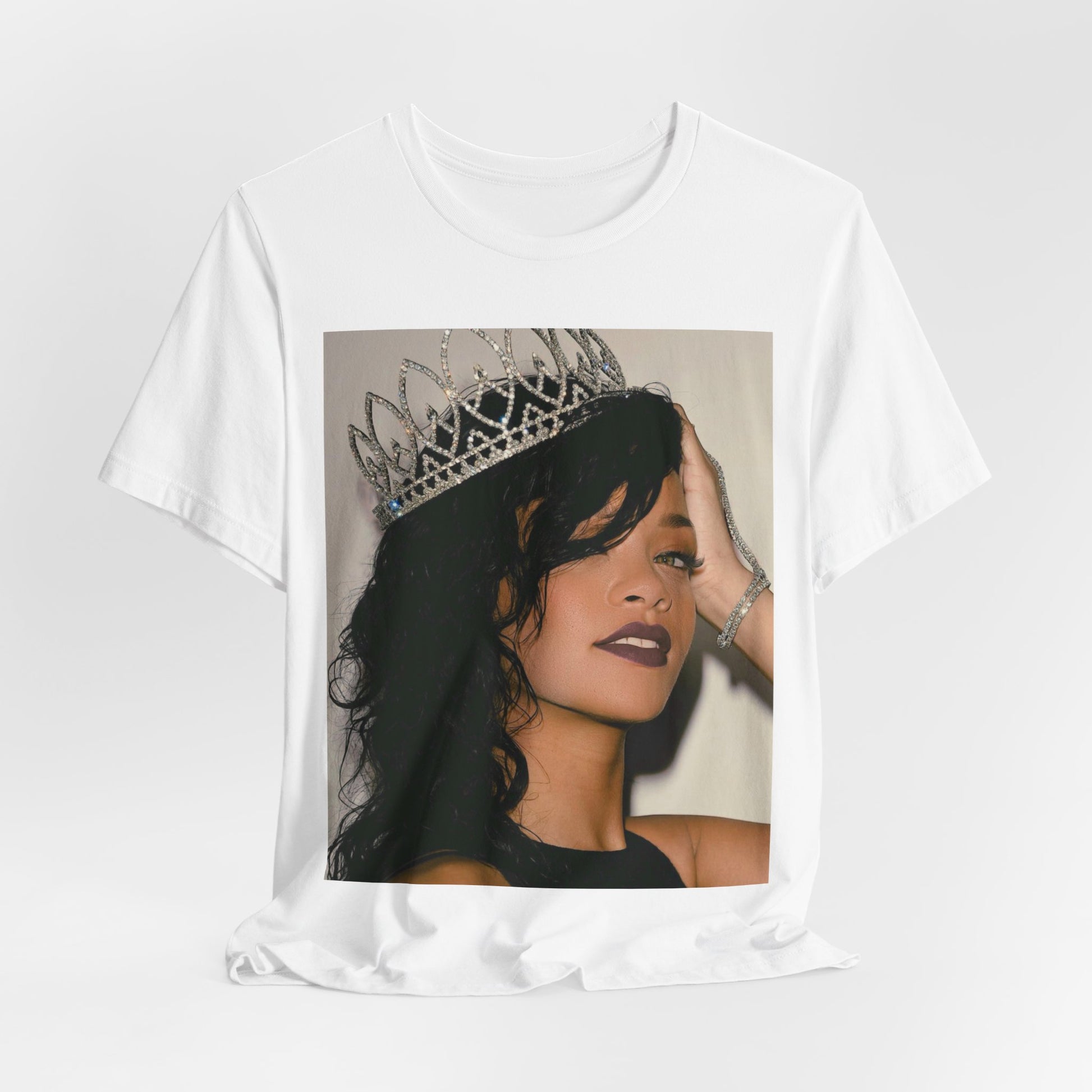 A black graphic t-shirt featuring a Y2K pop aesthetic graphic of Rihanna.