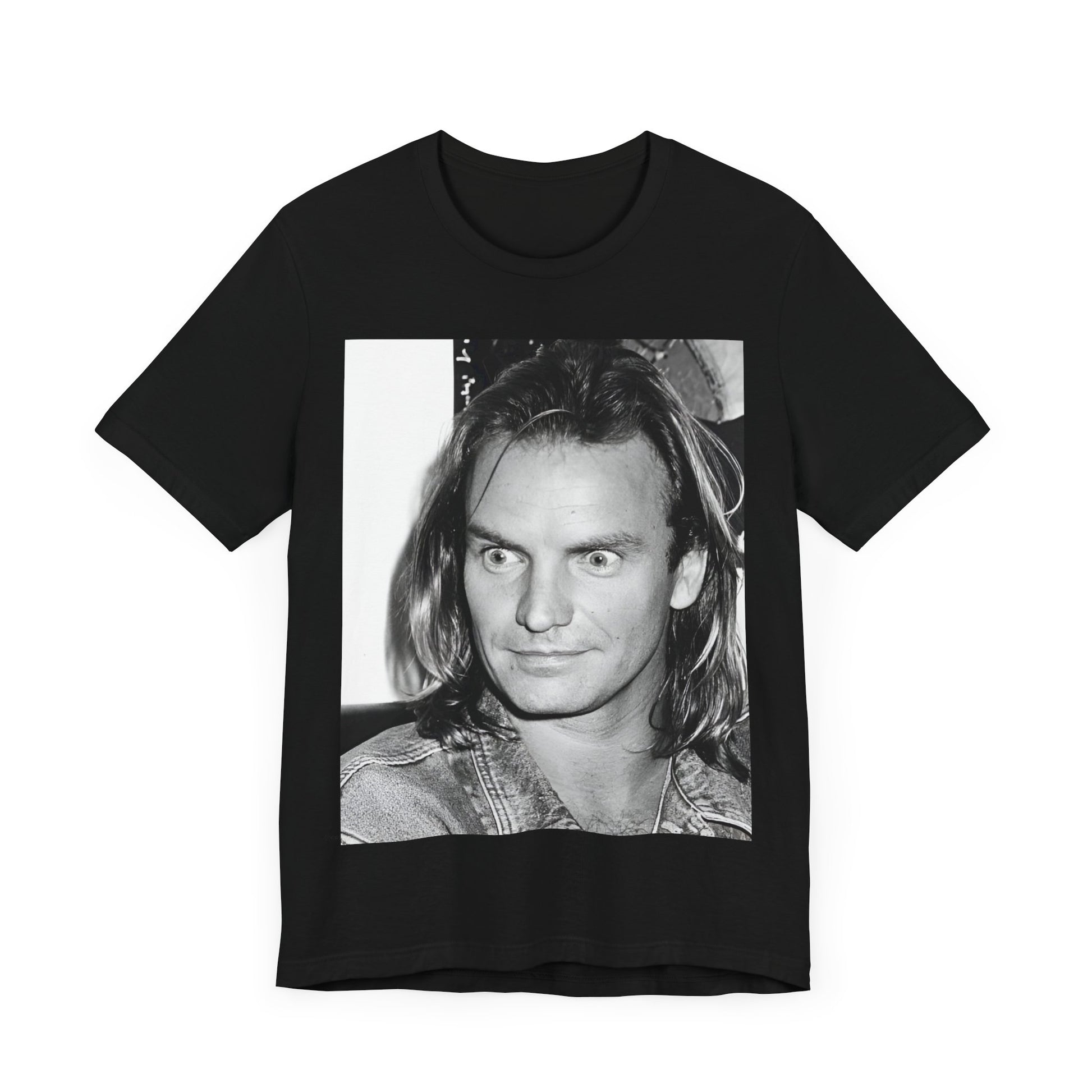 A black graphic t-shirt featuring a retro graphic related to Sting's 'Synchronicity' album era.