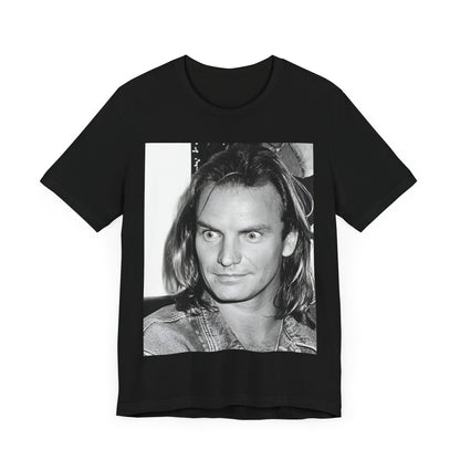 A black graphic t-shirt featuring a retro graphic related to Sting's 'Synchronicity' album era.