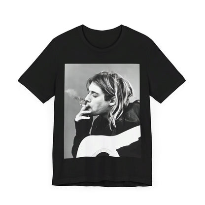 A black graphic t-shirt featuring a vintage photo of a Nirvana member with a cigarette.