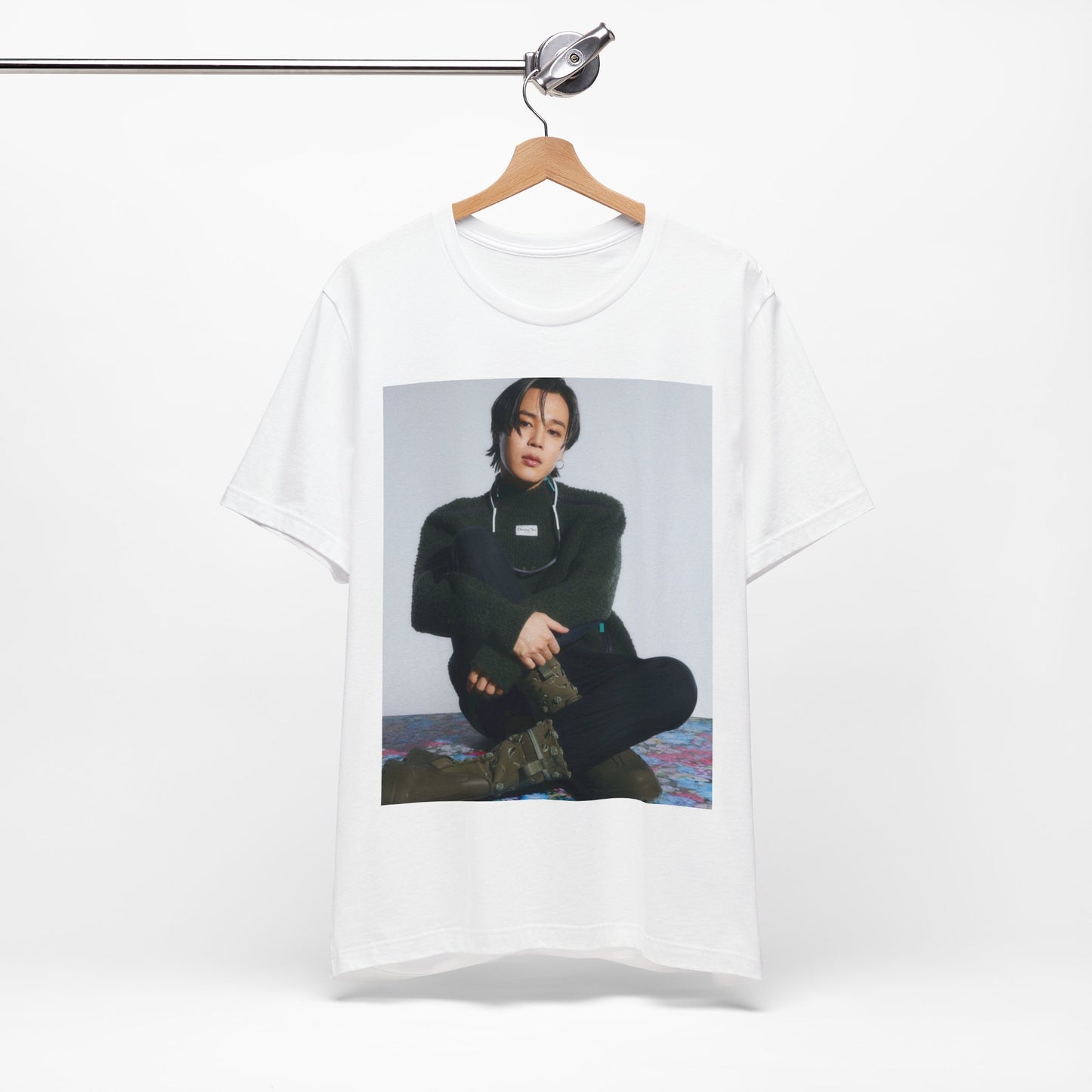 A black graphic t-shirt featuring a modern K-Pop essential graphic of Jimin.