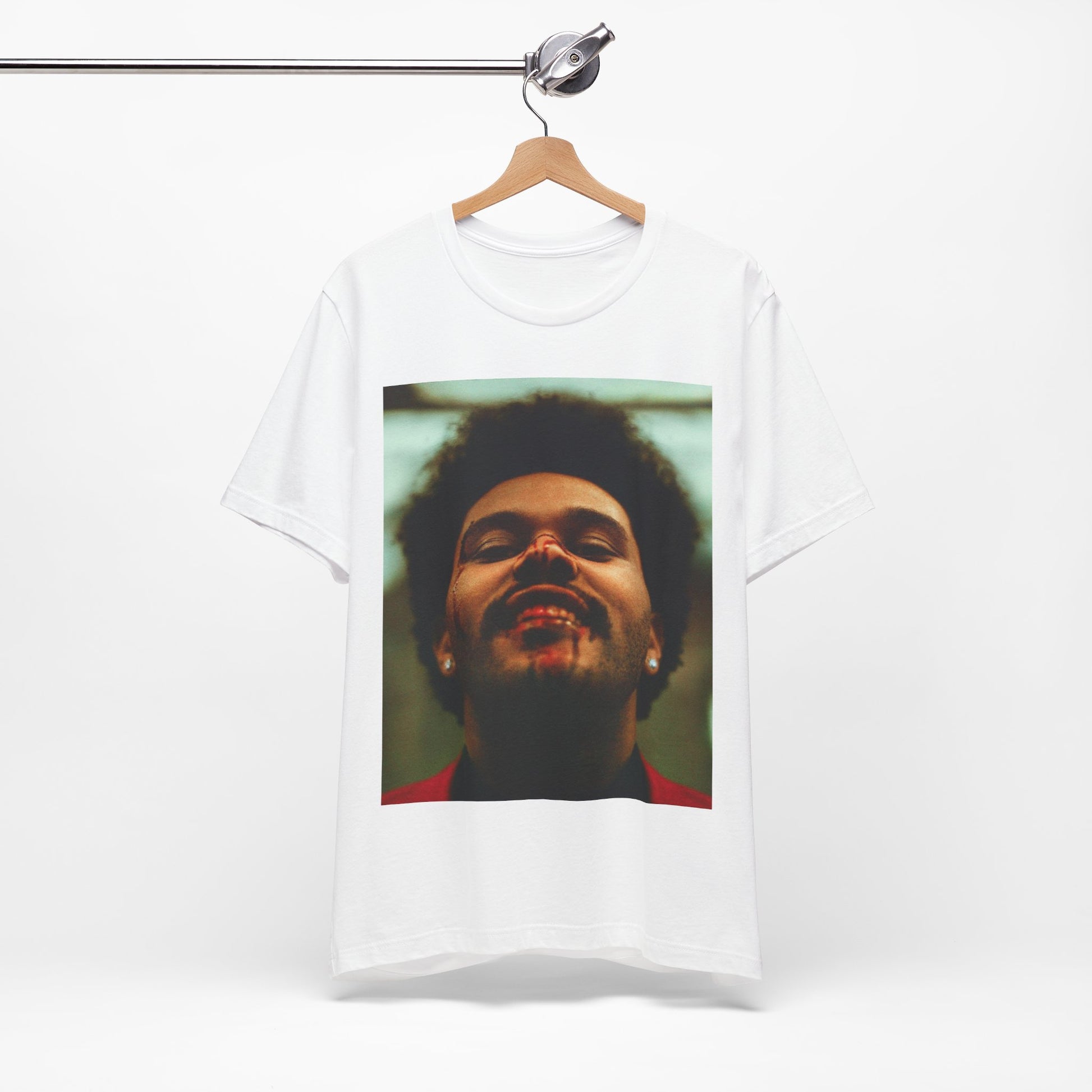 A black graphic t-shirt featuring the album cover art for The Weeknd's 'After Hours'.