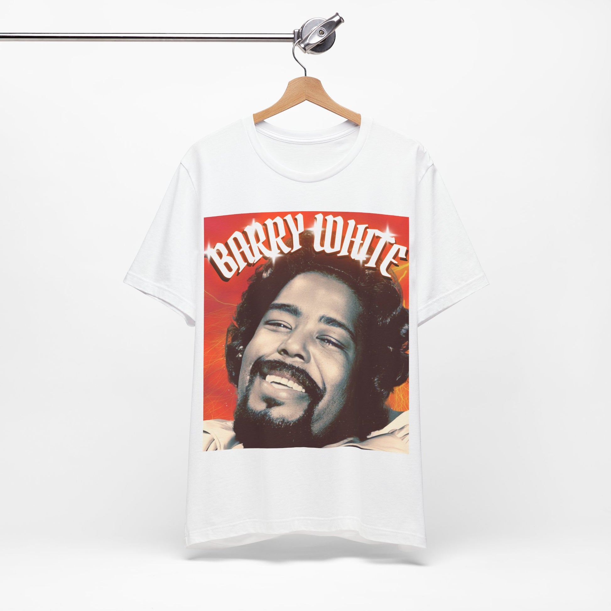 A black graphic t-shirt featuring a graphic of Barry White, emphasizing his iconic soulful presence from the 1970s.