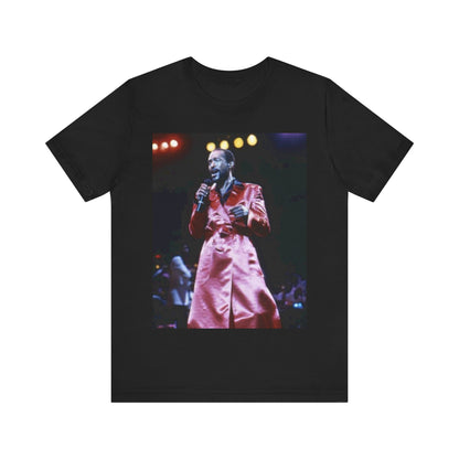 A black graphic t-shirt featuring a vintage graphic or photo of Marvin Gaye performing live.
