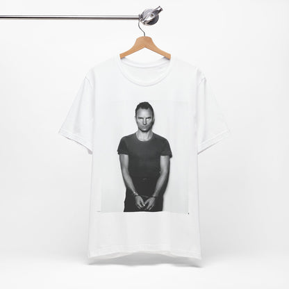 A black graphic t-shirt featuring a black and white portrait photo of Sting.