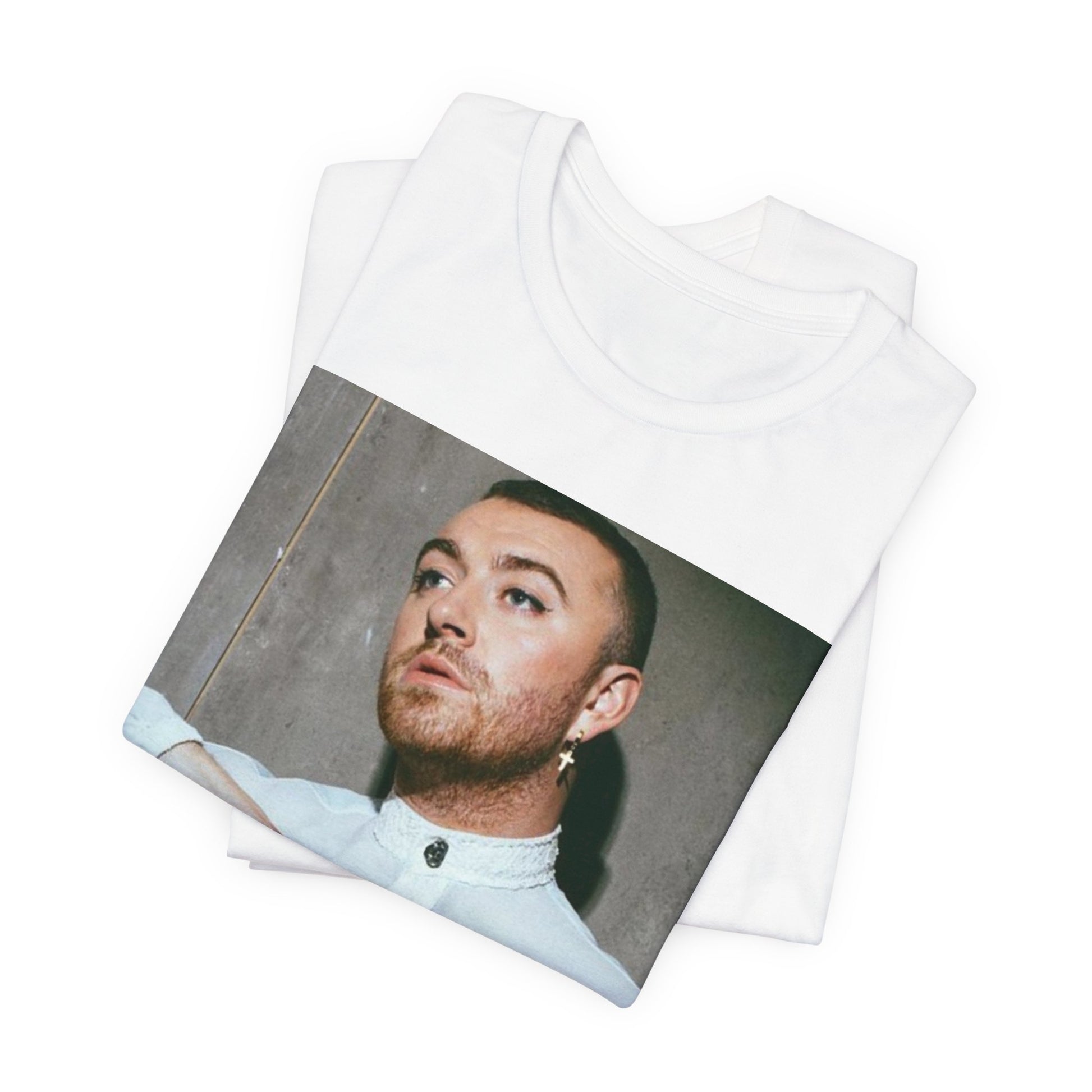 A black graphic t-shirt featuring a vintage graphic of Sam Smith emphasizing their soulful voice.