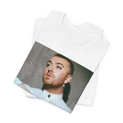 A black graphic t-shirt featuring a vintage graphic of Sam Smith emphasizing their soulful voice.