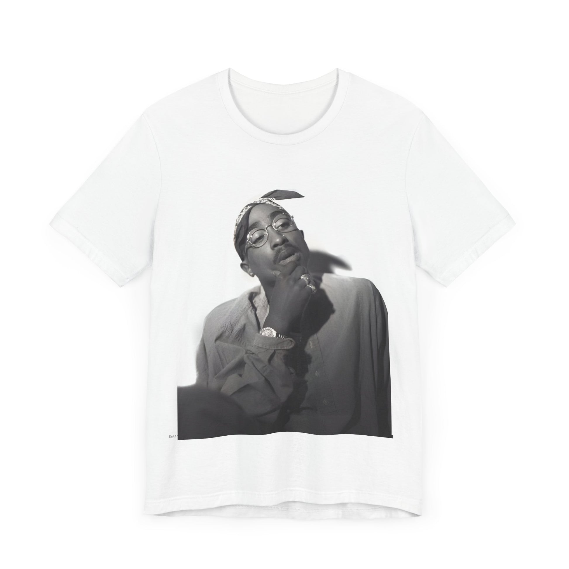 A black graphic t-shirt featuring a classic 90s West Coast rap graphic of Tupac.