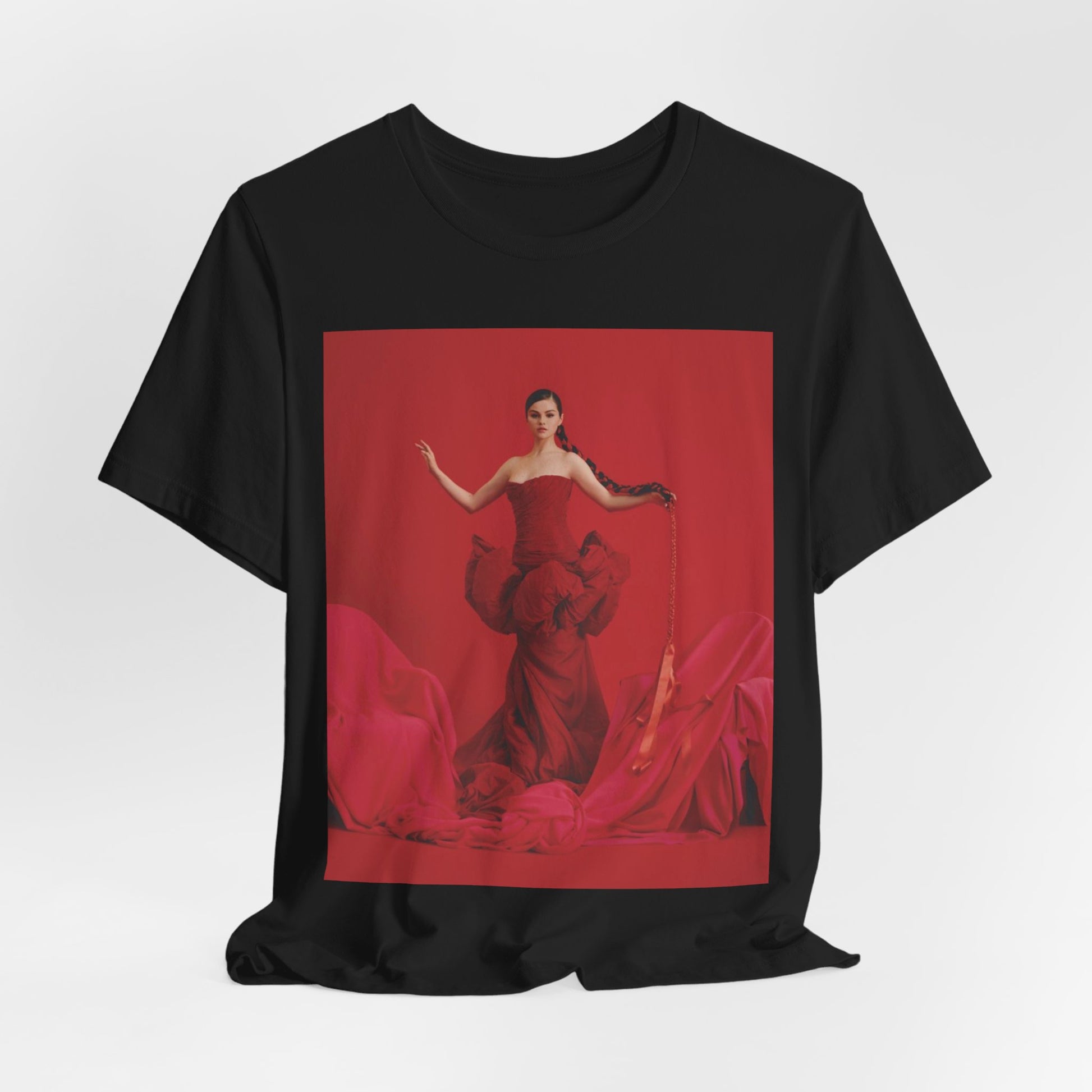 A black graphic t-shirt featuring a glam pop diva graphic of Selena Gomez.