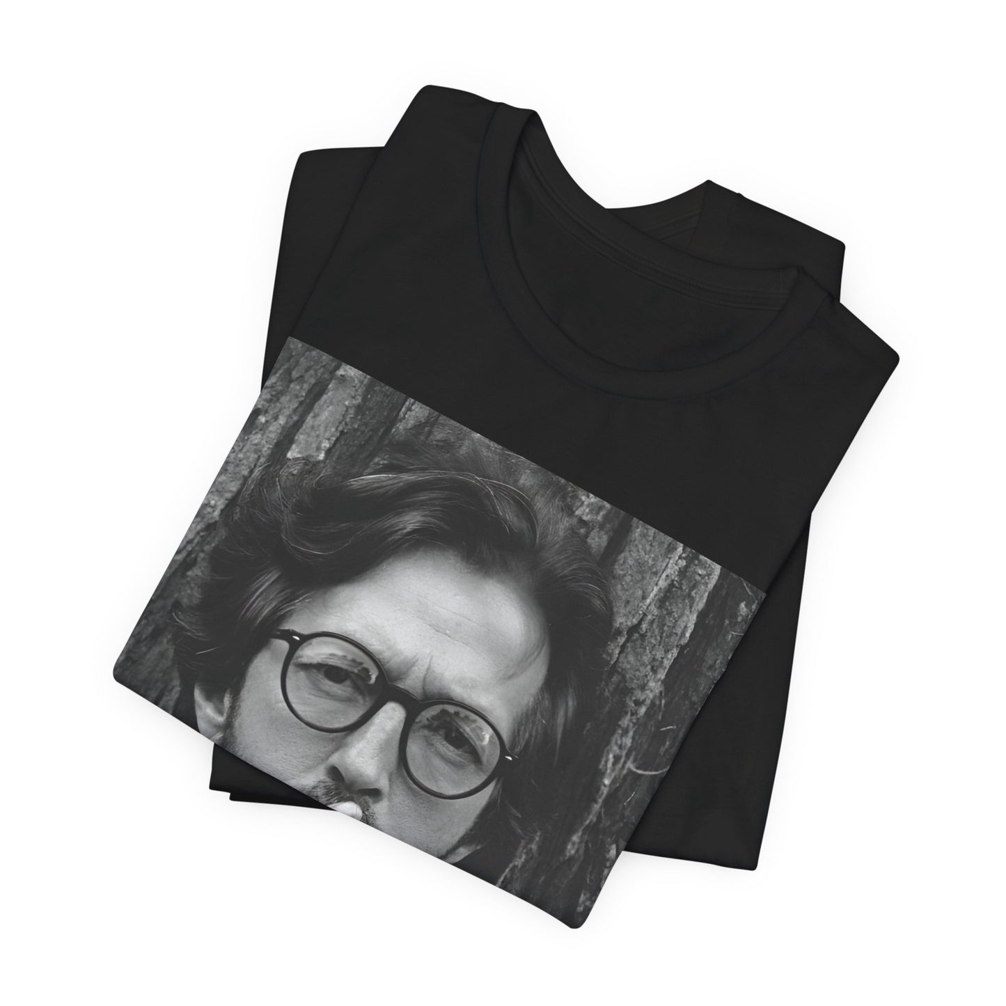 A black graphic t-shirt featuring a graphic related to Eric Clapton's classic Cream era.