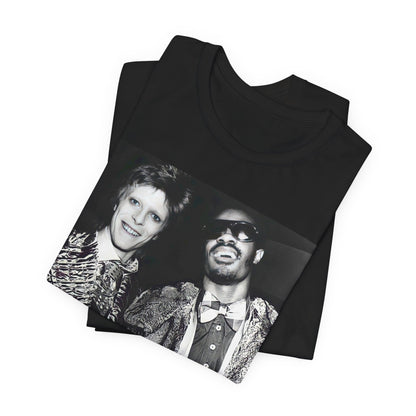 A black graphic t-shirt featuring a retro graphic of Stevie Wonder and David Bowie together.