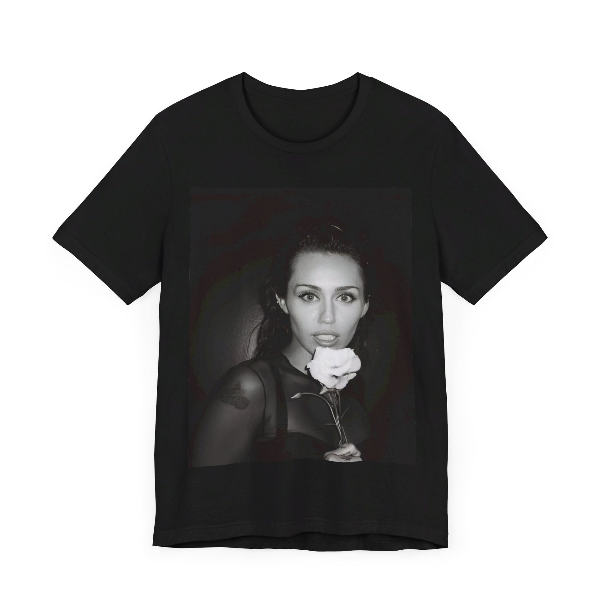 A black graphic t-shirt featuring a graphic related to Miley Cyrus' 'Flowers' song or era.