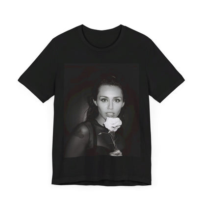A black graphic t-shirt featuring a graphic related to Miley Cyrus' 'Flowers' song or era.