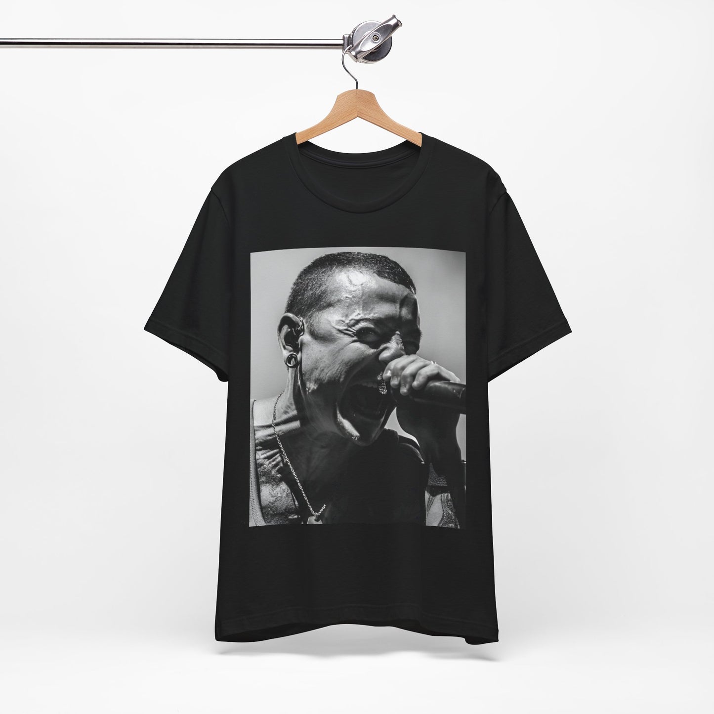 A black graphic t-shirt featuring a fierce graphic of Linkin Park performing live on stage.
