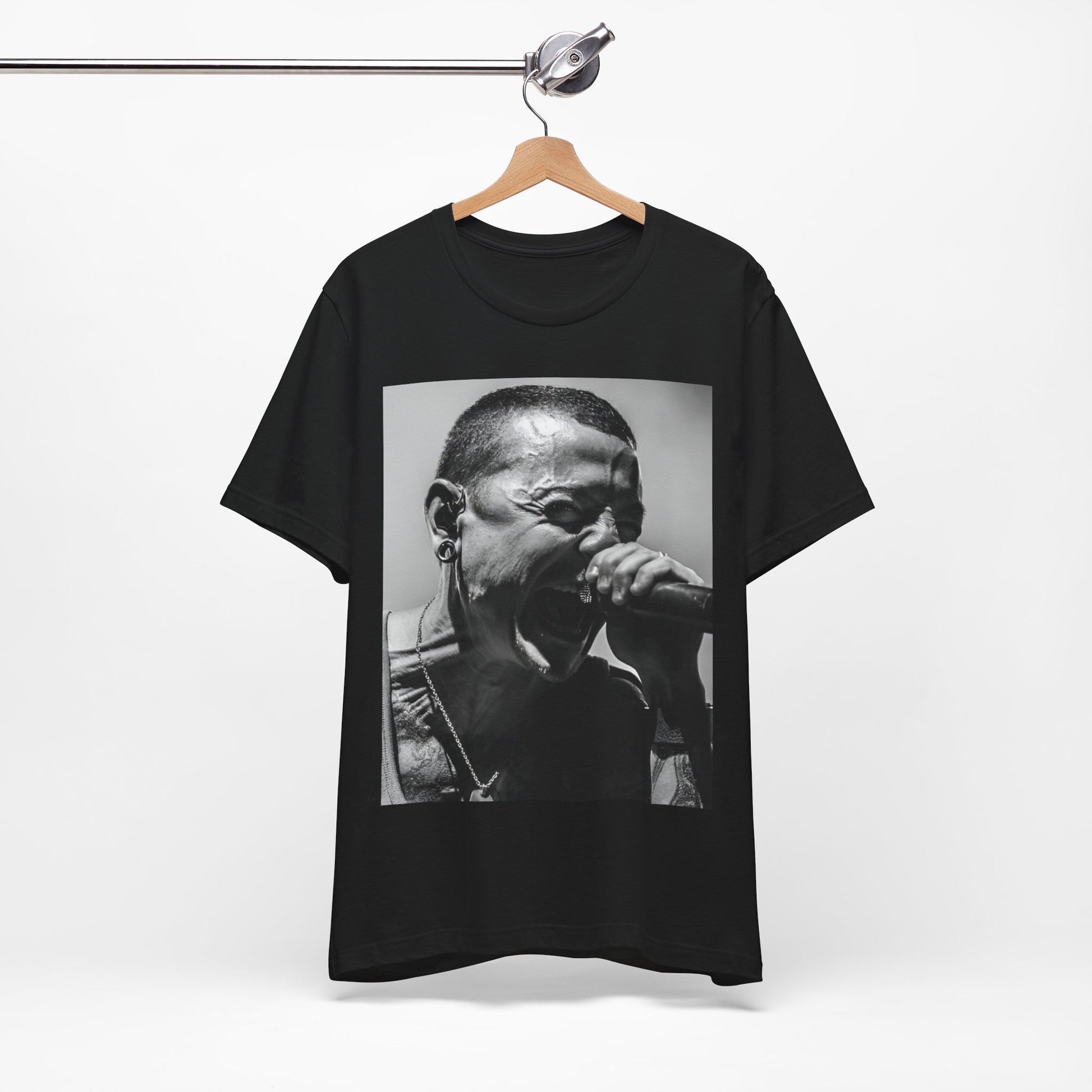 A black graphic t-shirt featuring a fierce graphic of Linkin Park performing live on stage.