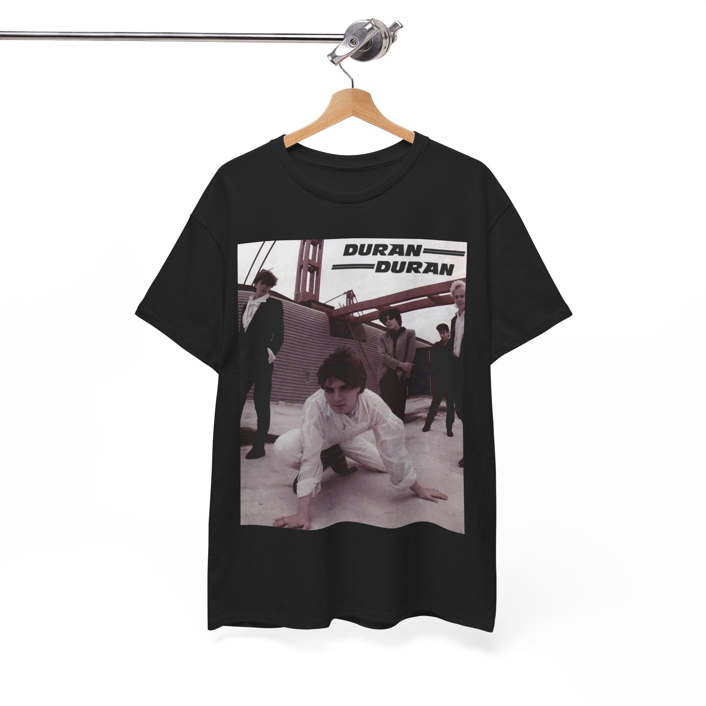 A black graphic t-shirt featuring a graphic related to Duran Duran's 'Hungry Like the Wolf' song or era.