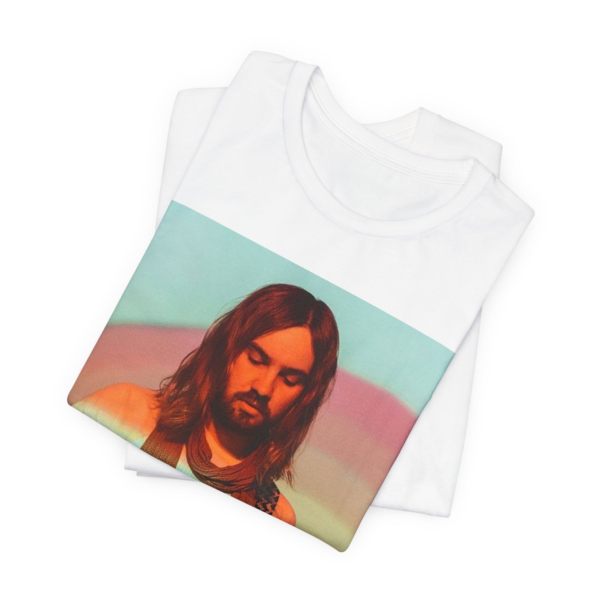 A black graphic t-shirt featuring a dream rock aesthetic graphic of Tame Impala.