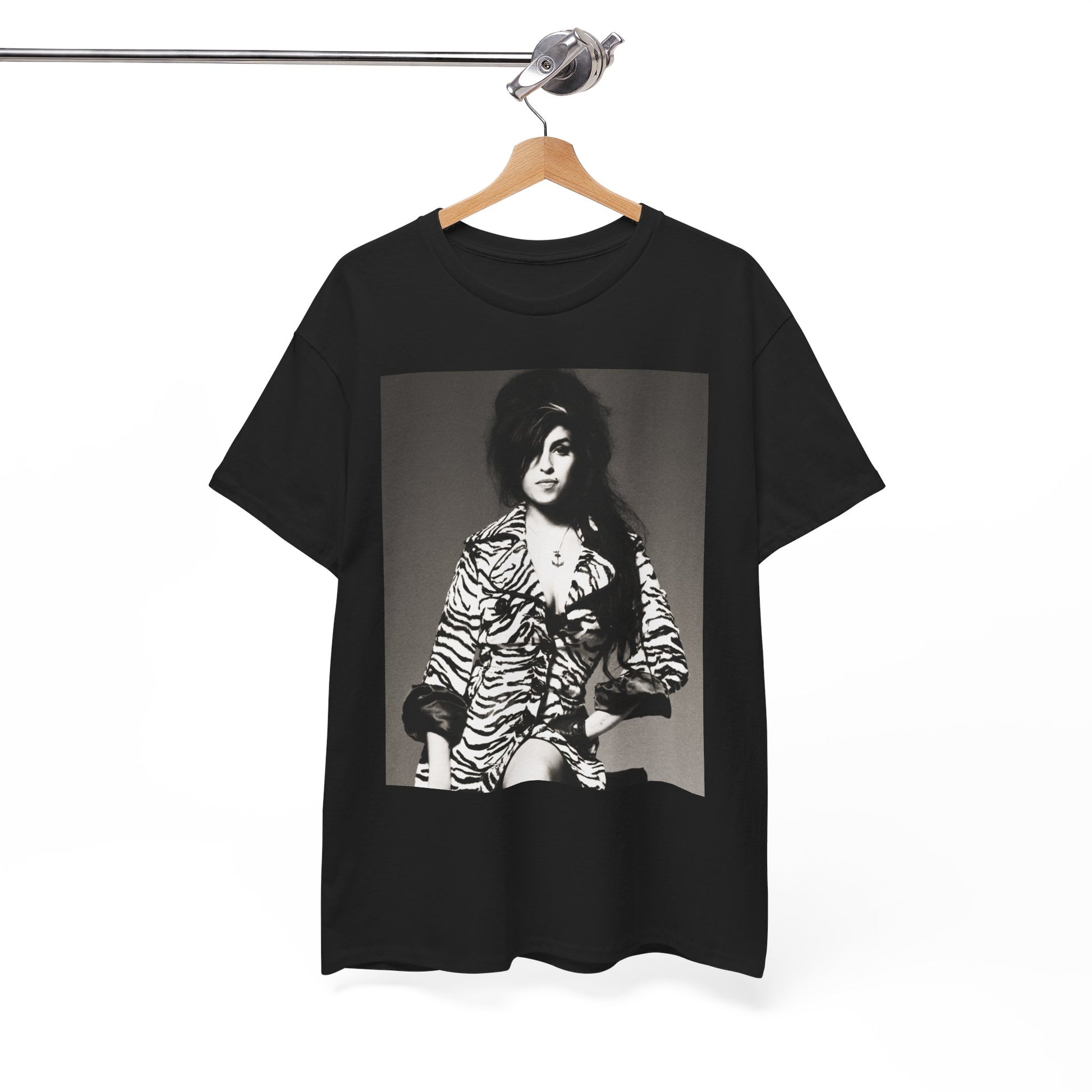 A black graphic t-shirt featuring a vintage black and white portrait of Amy Winehouse, showing her with her signature beehive and soulful expression.