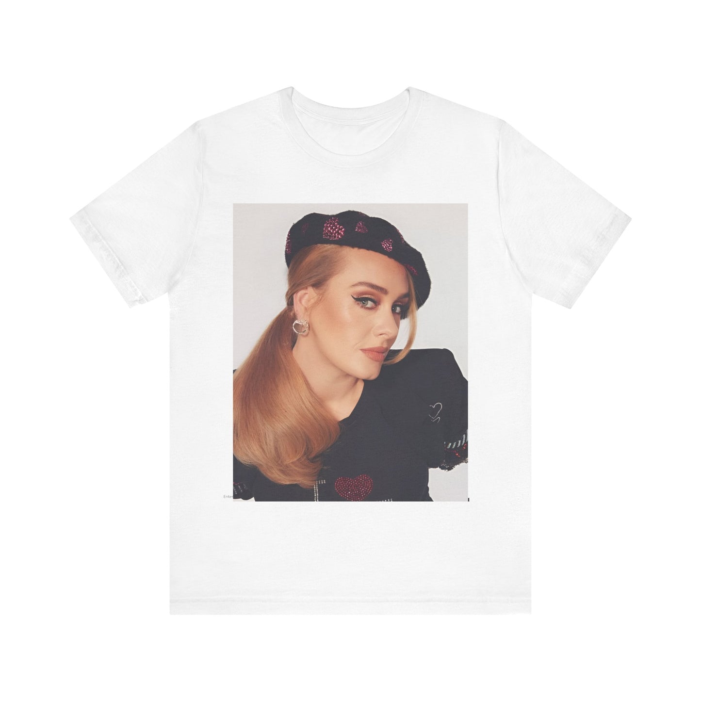 A black graphic t-shirt featuring a black and white photo of Adele wearing a heart-shaped beret, with a gentle or smiling expression.