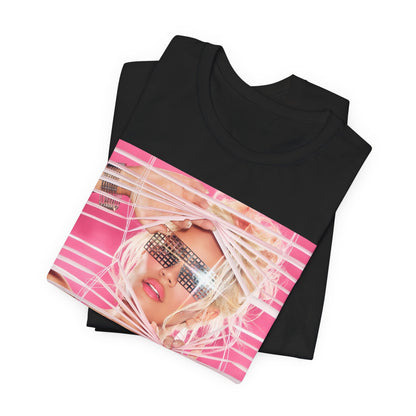 A black graphic t-shirt featuring a graphic of Karol G in a cool Latin trap style.