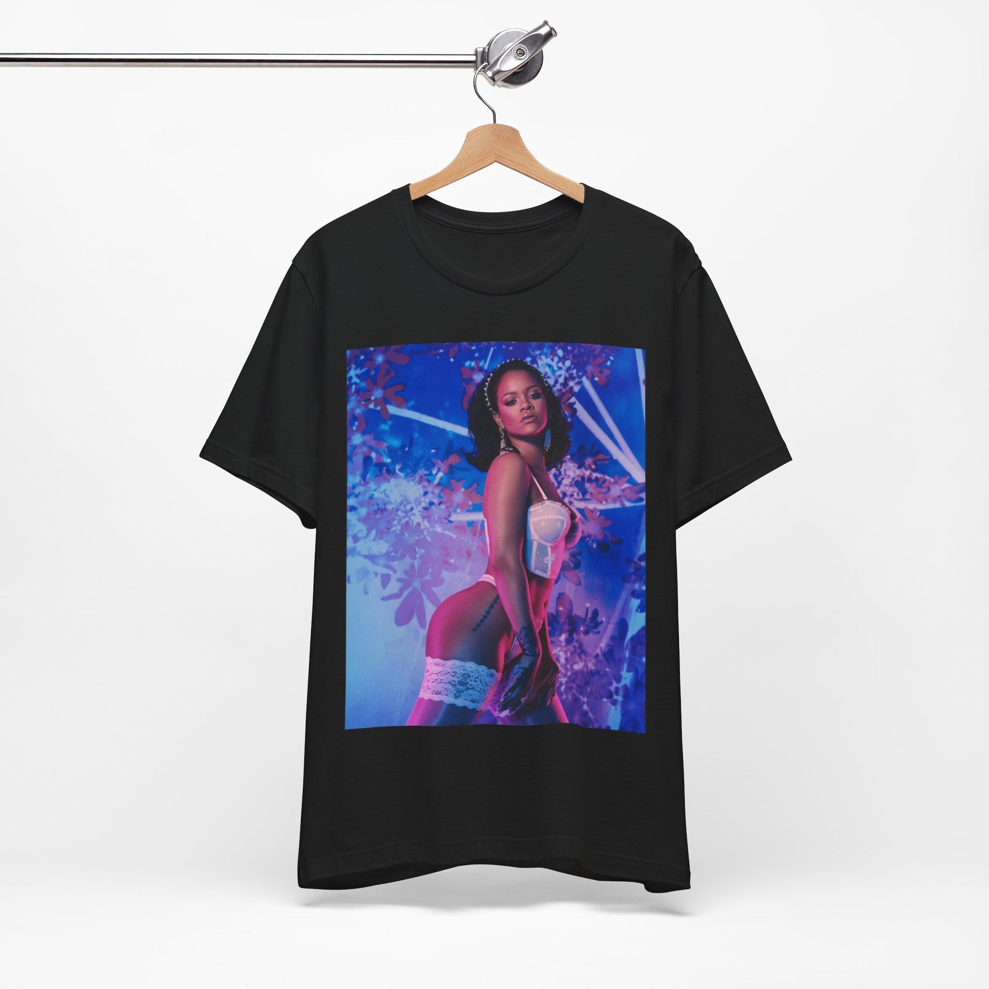 A black graphic t-shirt featuring a graphic of Rihanna as a lingerie goddess.