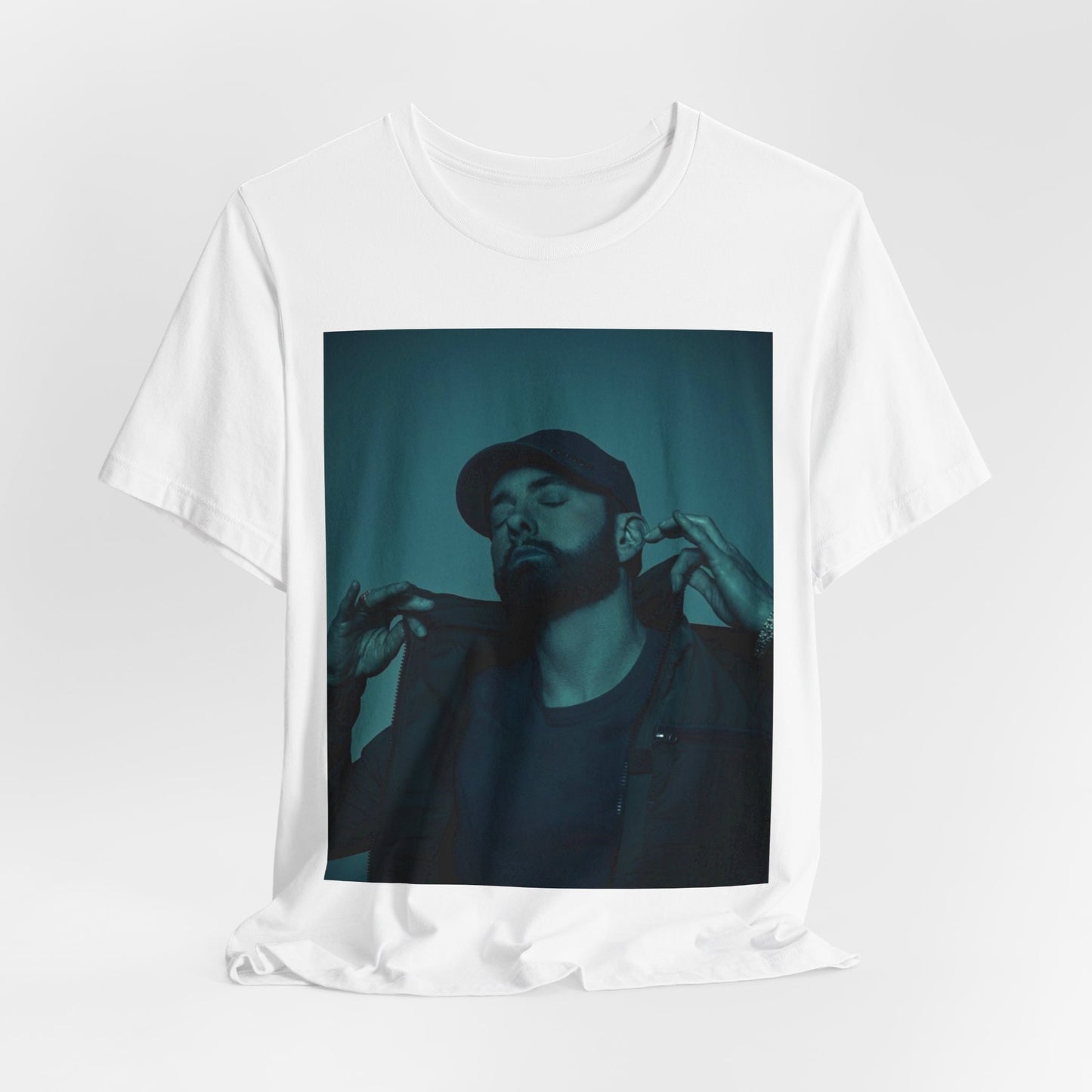 A black graphic t-shirt featuring a graphic of Eminem as a 'Rap God'.