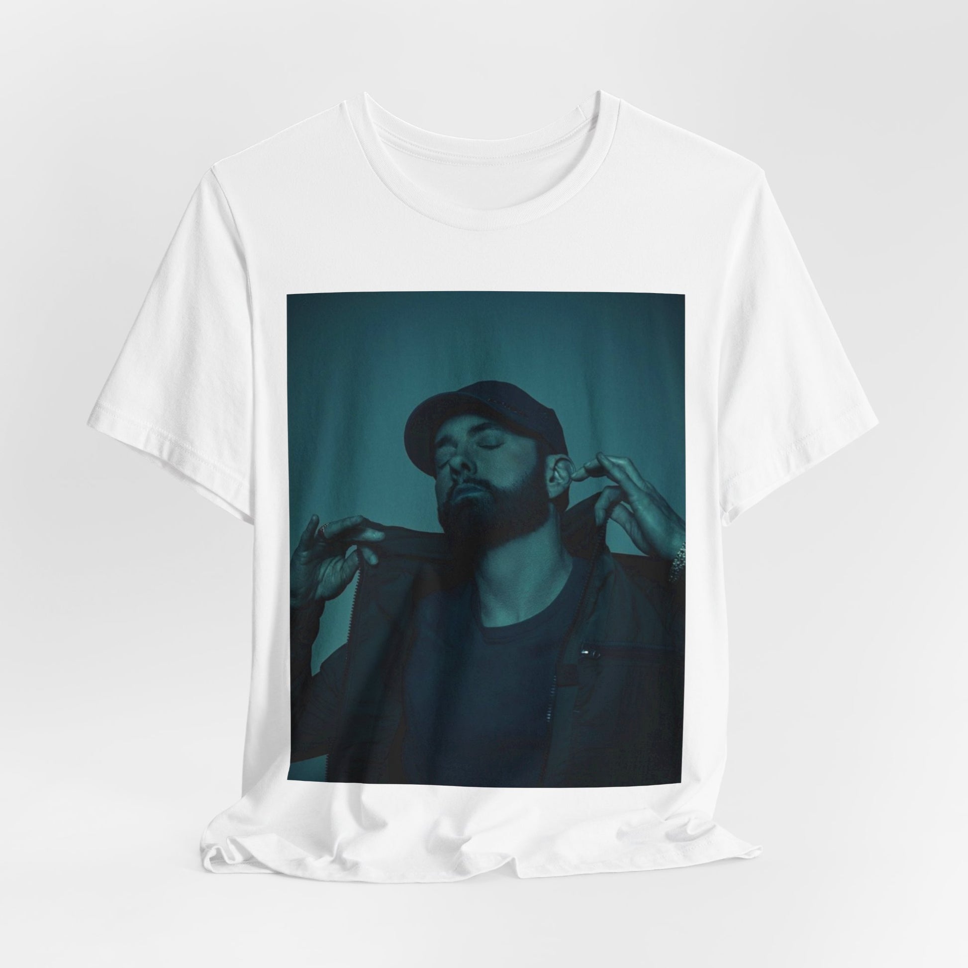 A black graphic t-shirt featuring a graphic of Eminem as a 'Rap God'.